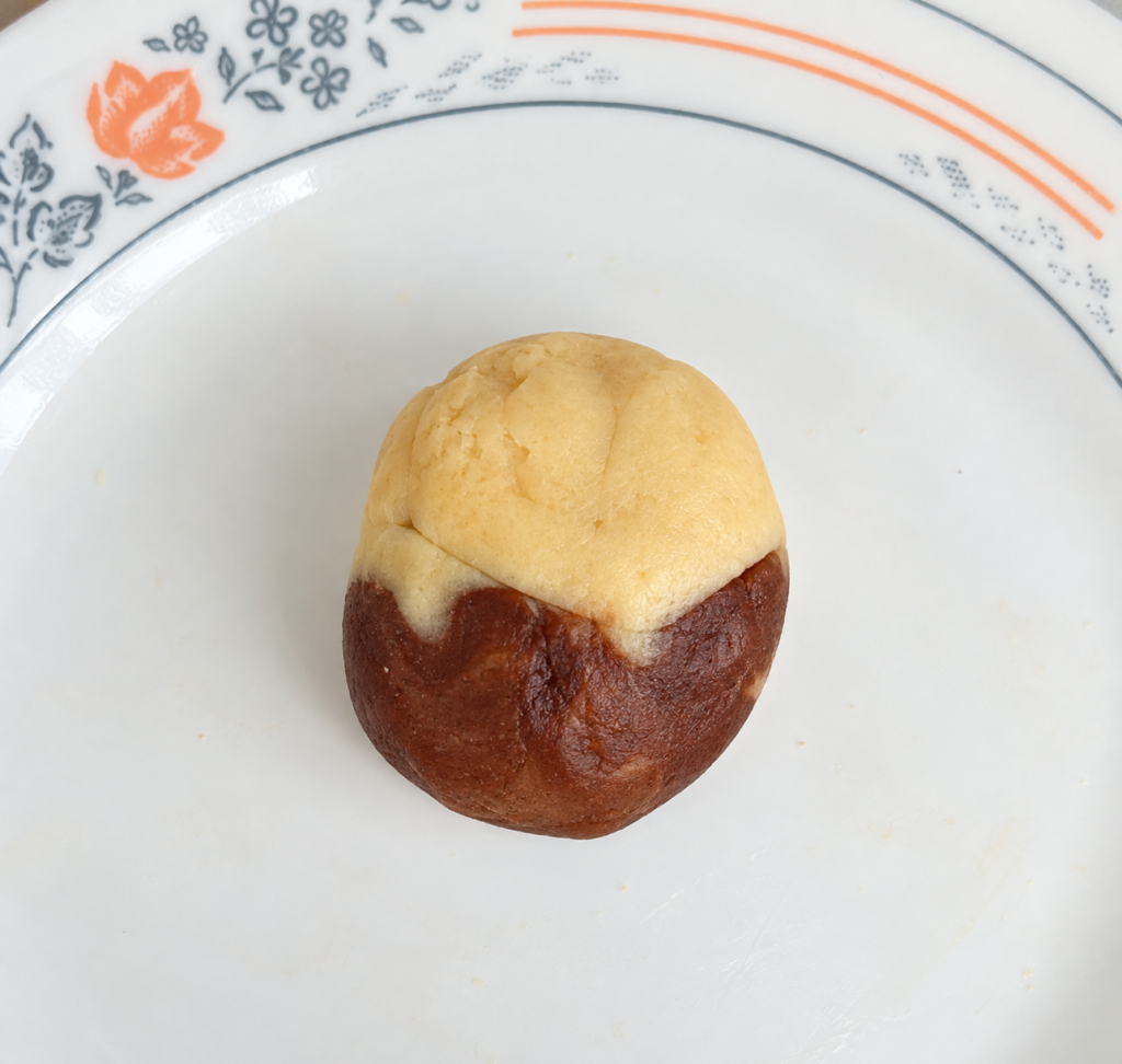 Vanilla and chocolate cookie dough pieces combined to make marble cookies