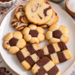 Vanilla and chocolate cookies in marble, flower and checkerboard designs