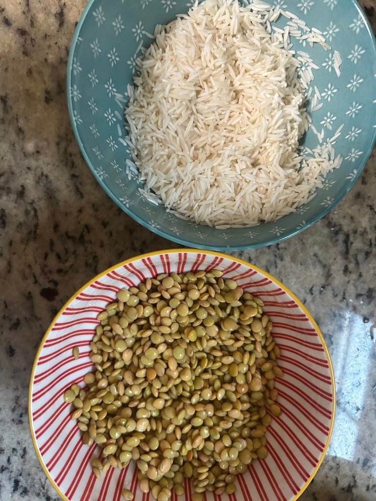 Soaked whole black masoor dal and basmati rice ready for making khichdi.